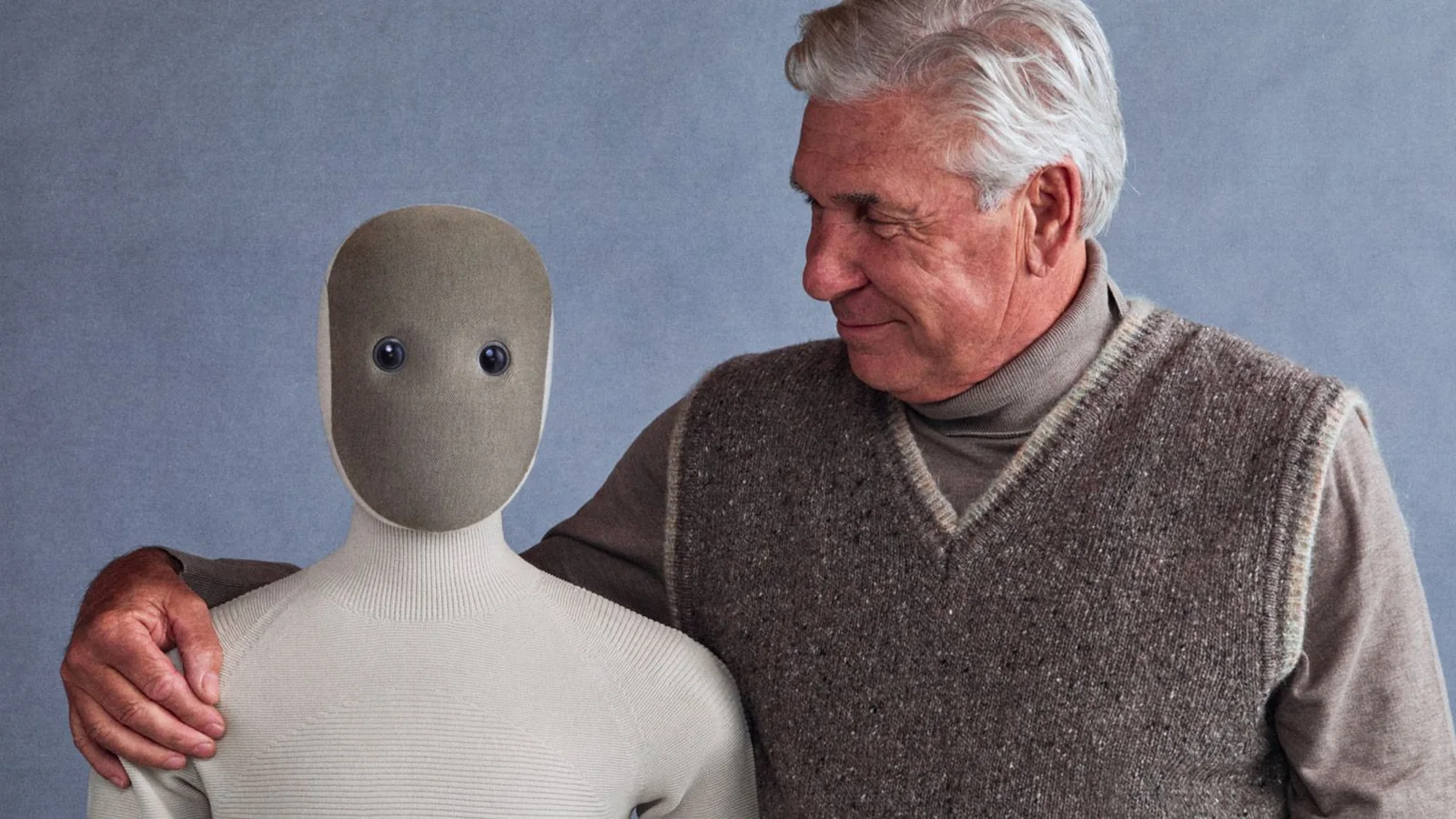 Imagen oficial del robot humanoide doméstico NEO de 1X junto a una persona